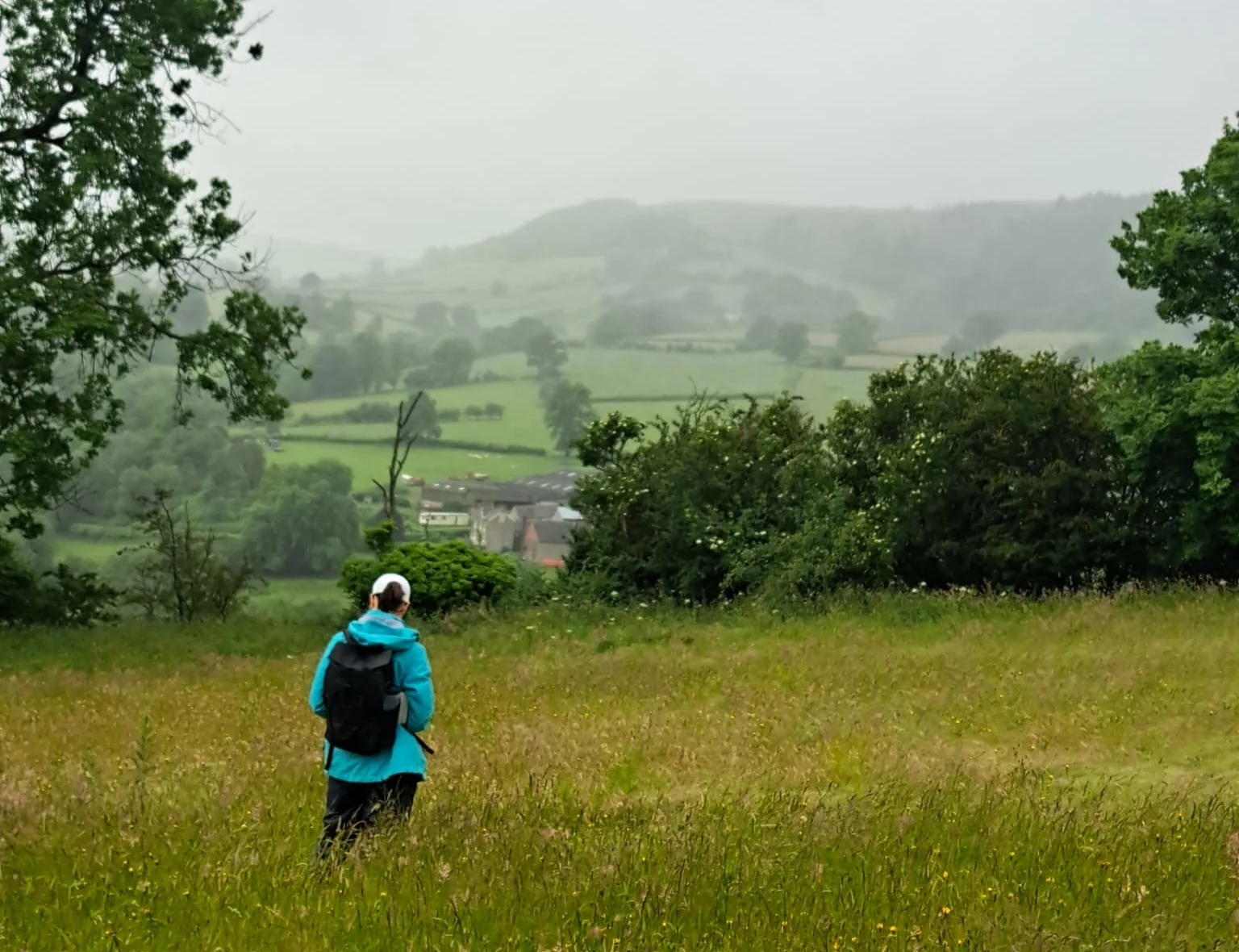 Ecologist carrying out a survey on Coreo in a field